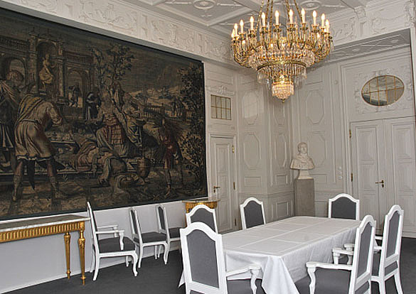 Tapestry Room: white room with white furniture and a tepestra at the wal
