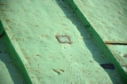 Geflickte Stelle im alten Kupferdach